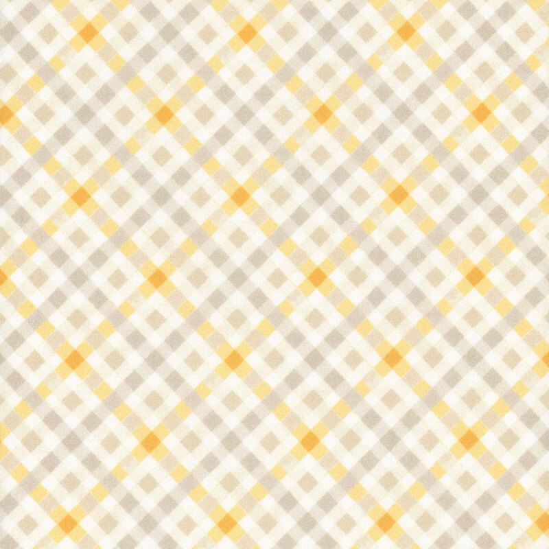 Yellow, white, and tan plaid fabric
