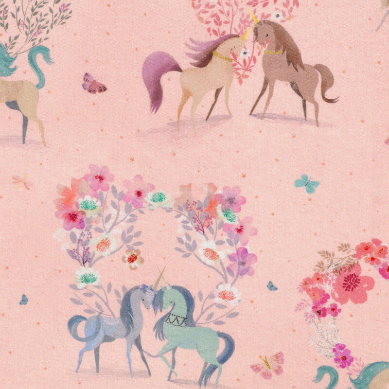 light pink fabric featuring scattered darker pink stars and butterflies amidst whimsical unicorns with floral hearts