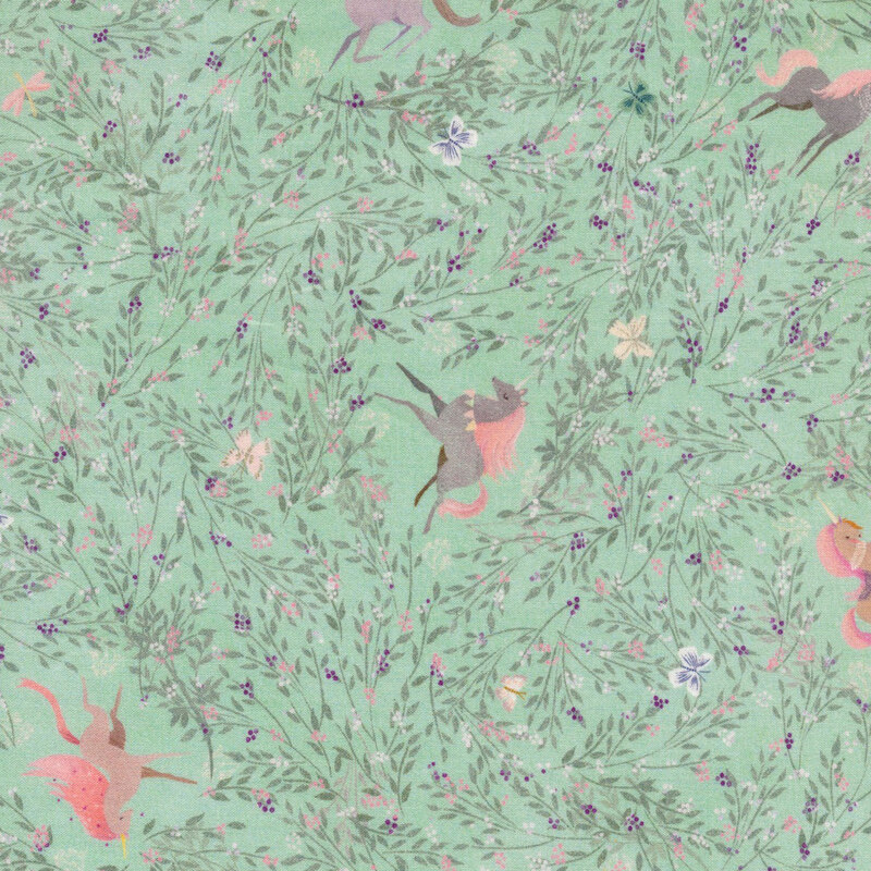 seafoam green fabric featuring a darker teal vine and leaf design with scattered butterflies and flowers, with unicorns situated in empty spaces