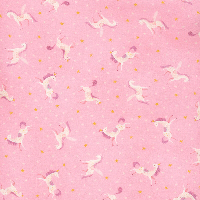beautiful pink fabric featuring scattered white unicorns with white and gold stars intermixed