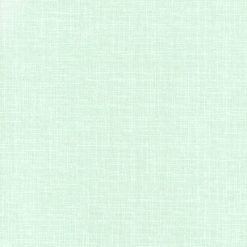 Light mint green tonal linen textured basic fabric from the Quilter's Linen Collection