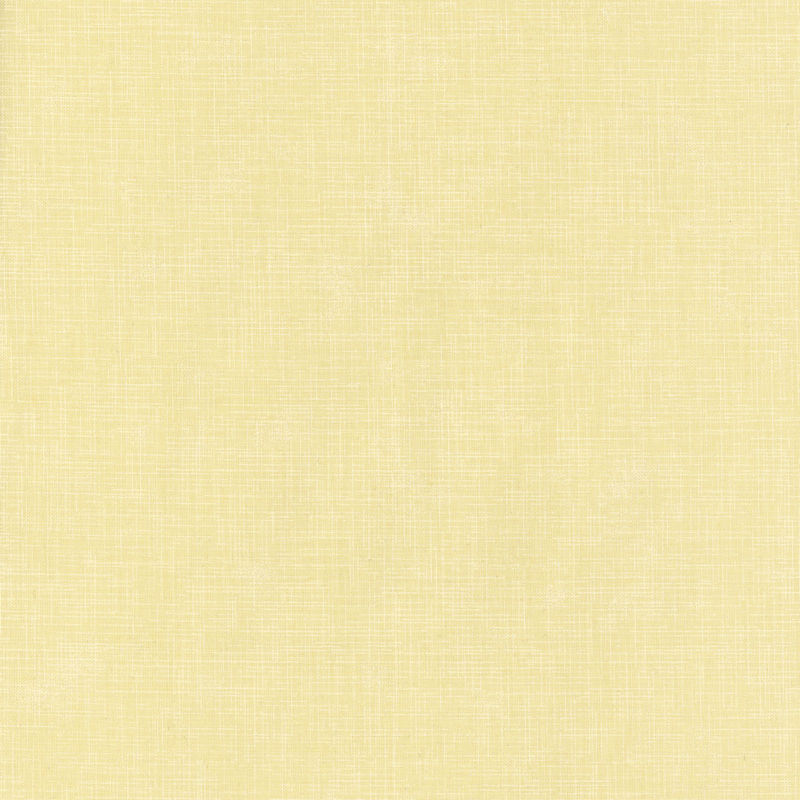 Pale yellow tonal linen textured basic fabric from the Quilter's Linen Collection