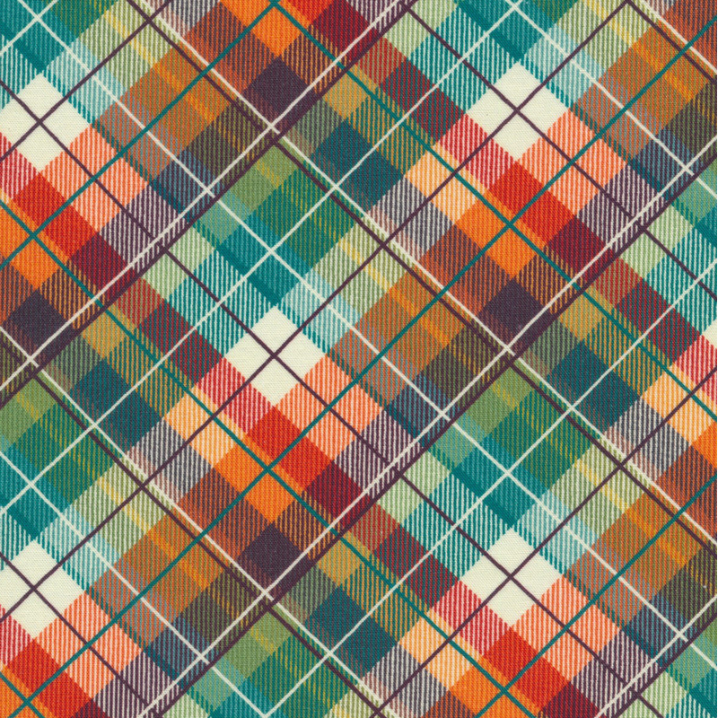 lovely muted plaid fabric featuring dark orange, brown, cream, and forest green coloring