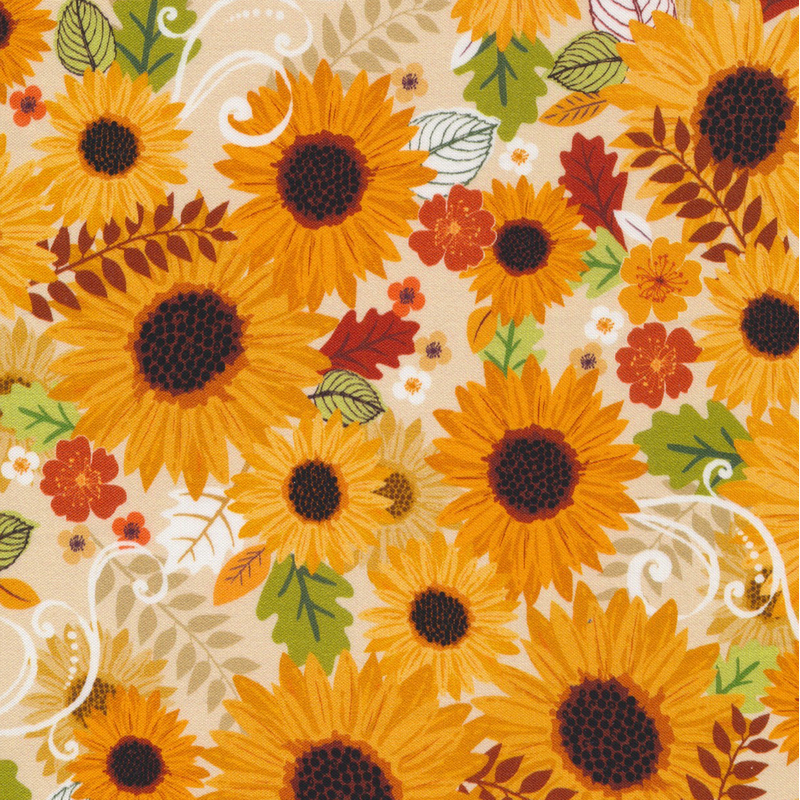 gorgeous cream fabric featuring stacked sunflowers with interspersed leaves, flowers, and white decorative scrolls