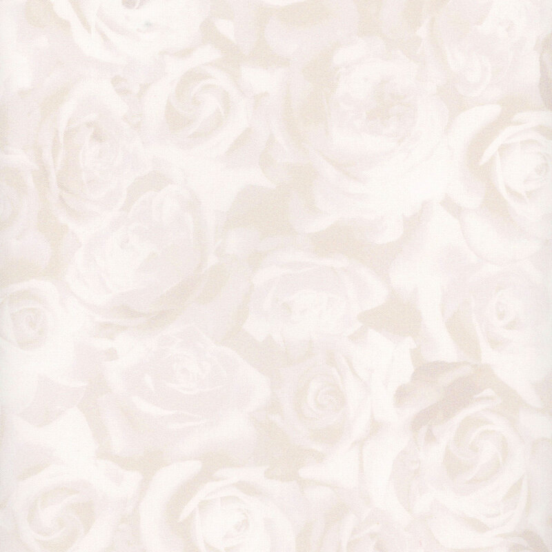 white fabric featuring layers of white roses