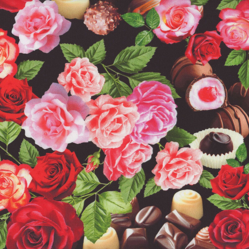 romantic black fabric featuring red and pink roses with chocolate truffles and cherry cordials mixed in