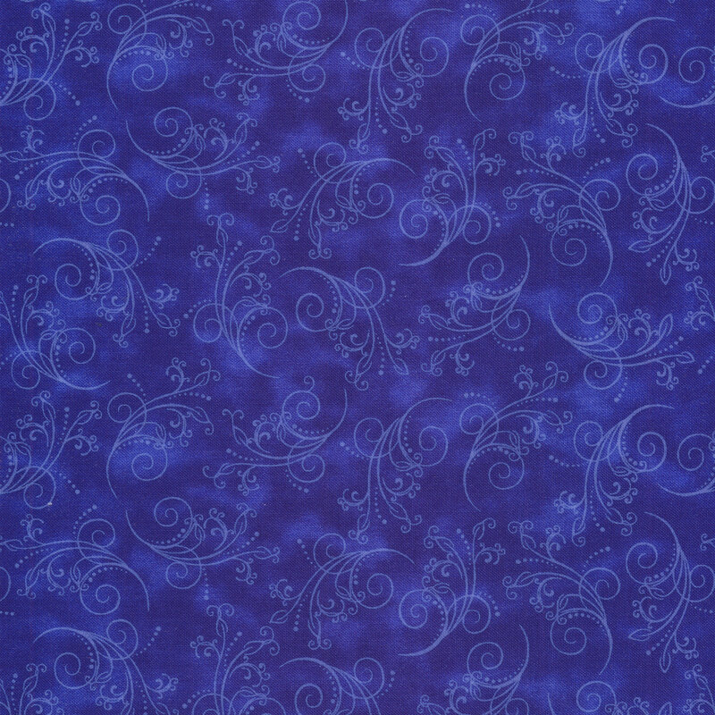 gorgeous royal blue fabric featuring tonal mottling and scattered pastel scrolling