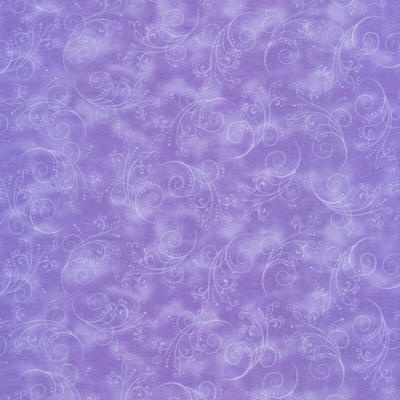 gorgeous dark periwinkle fabric featuring tonal mottling and scattered pastel scrolling