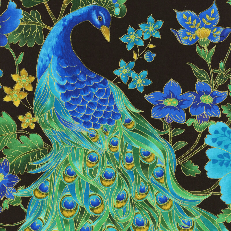 Metallic accented fabric with a large peacock among flowers, feathers, and swirling leaves and vines on a black background