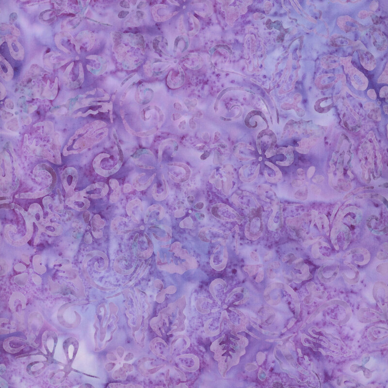 wonderful lavender and lilac fabric featuring tonal mottling and a scattered floral design
