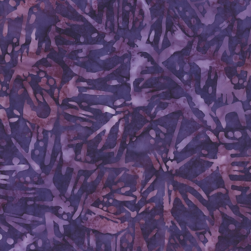 deep purple batik fabric featuring tonal mottling and mottled dark lilac abstract leaves