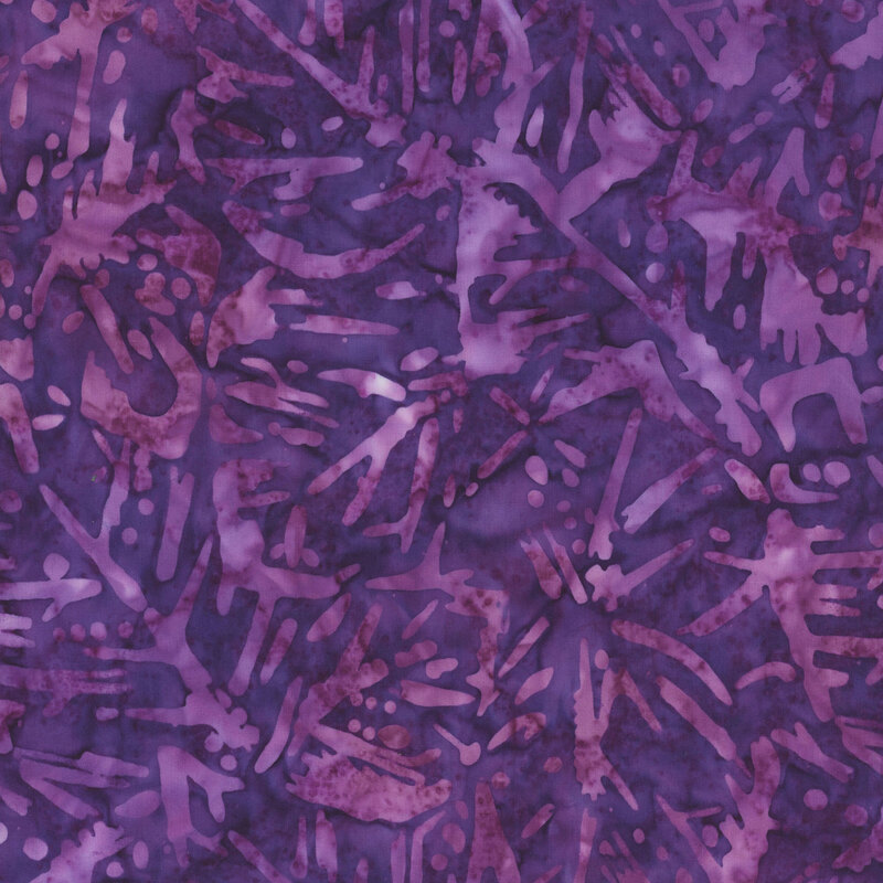 deep purple batik fabric featuring tonal mottling and mottled dark lilac abstract leaves