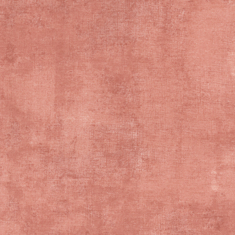fabric with a beautiful peach dry brush texture on a millennial pink background