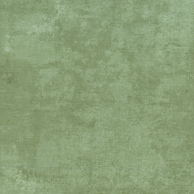 fabric featuring a beautiful dark sage dry brush texture on a lighter sage background