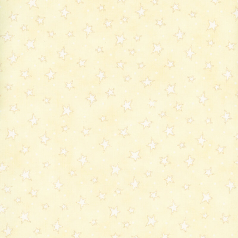 mottled cream fabric with scattered ditsy stars and tonal speckles