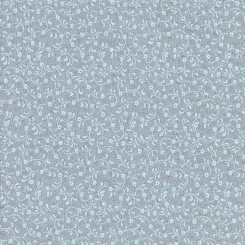 light gray tonal fabric with pale blue florals swirling across it