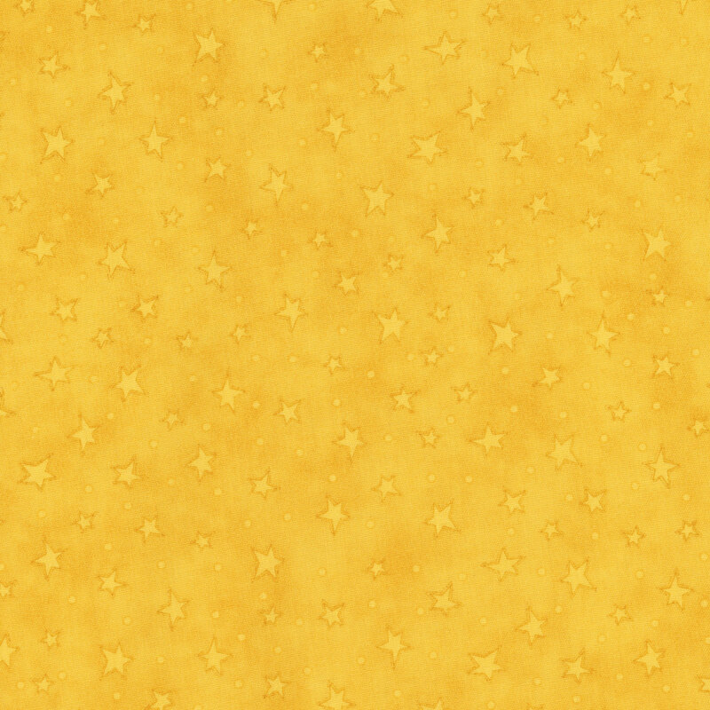 mottled yellow fabric with scattered ditsy stars and tonal speckles