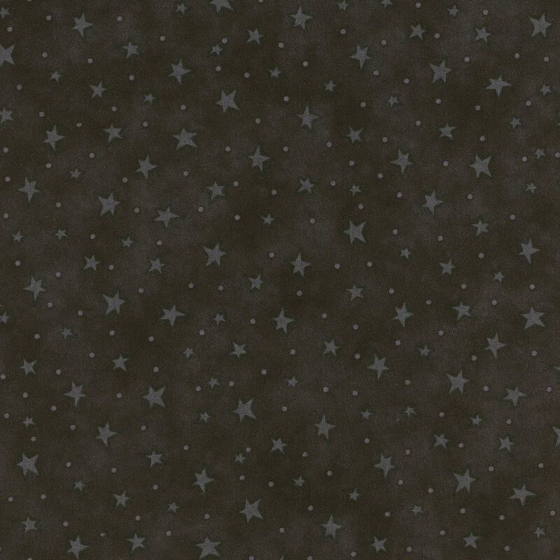mottled black fabric with scattered ditsy stars and tonal speckles