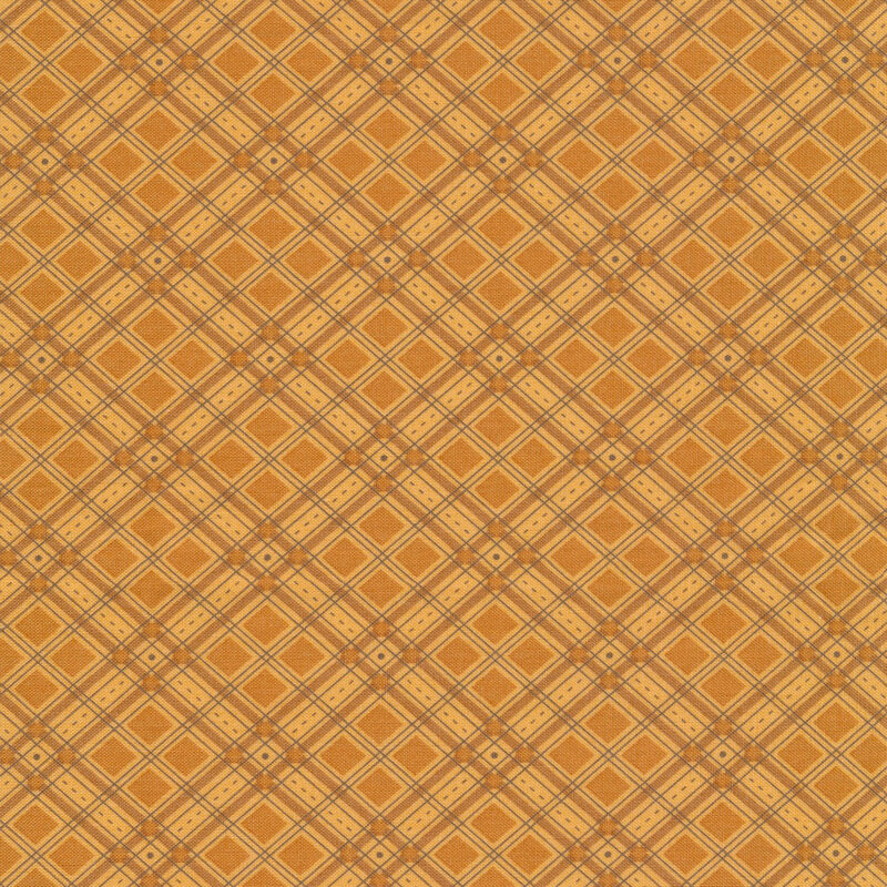 diagonal plaid fabric featuring lovely muted orange and light orange lines with muted orange diamond accents