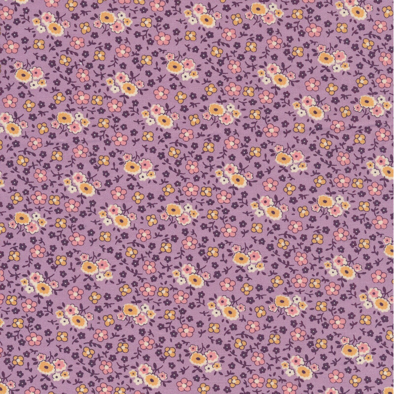 deep lavender fabric featuring a packed floral design, in subdued shades of eggplant, golden yellow, pink, and white
