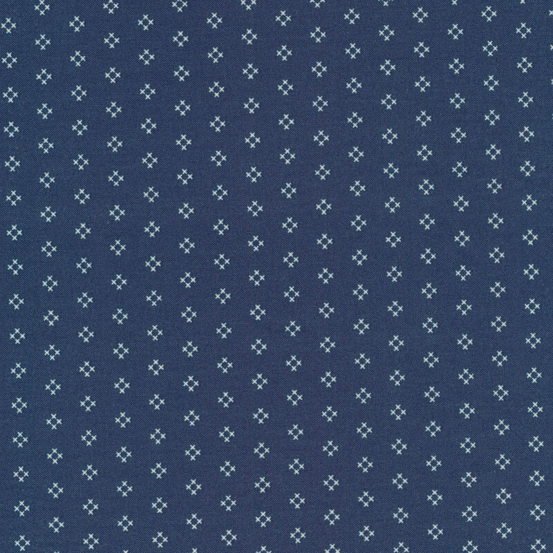 navy blue fabric featuring rows of white hash marks
