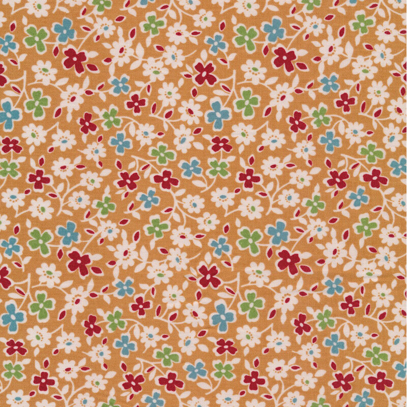 soft tan fabric featuring a scattered white floral design, with accents of red, teal, and green