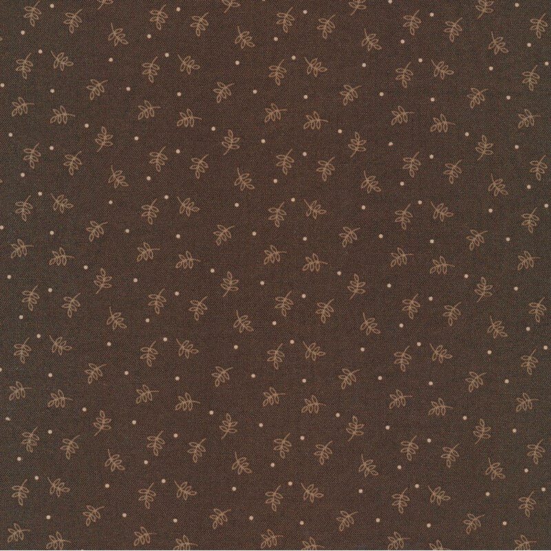 classic brown fabric featuring scattered taupe leaves and cream dots