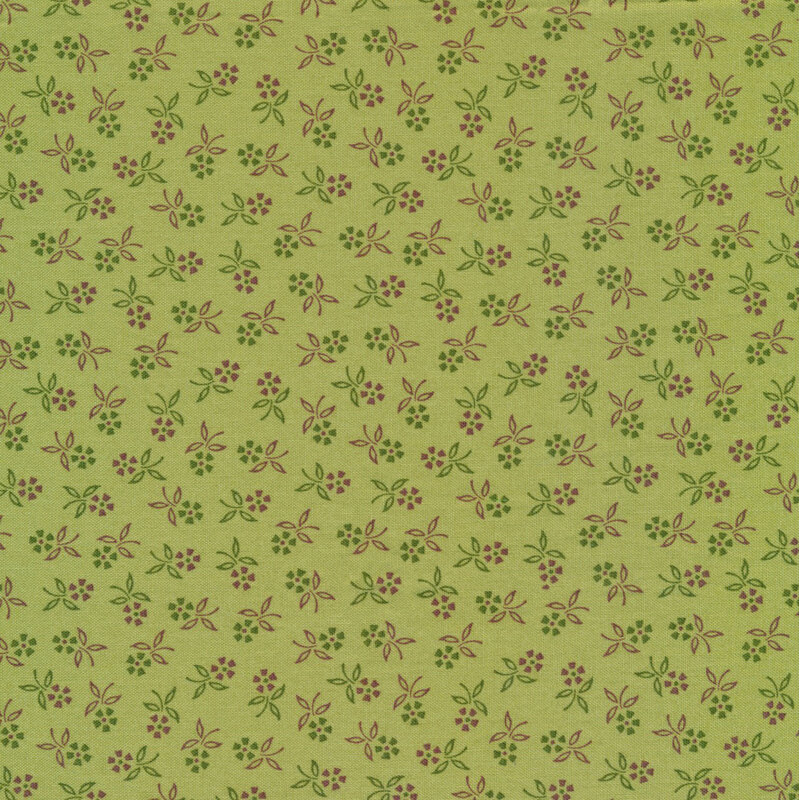 apple green fabric featuring scattered flowers in dark shades of green and purple