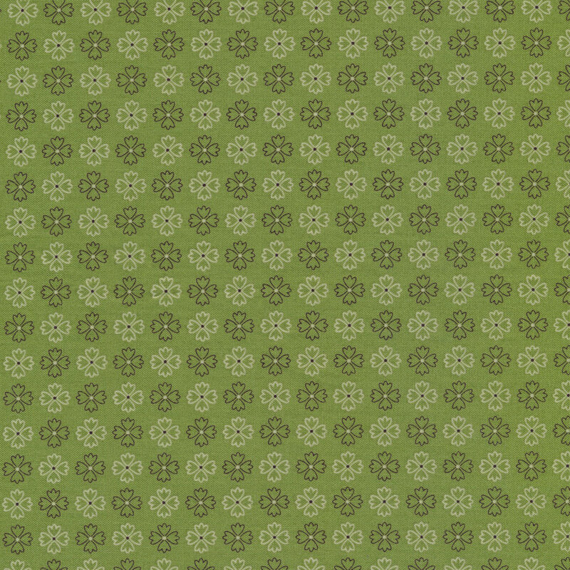 leaf green fabric featuring rows of alternating brown and cream flower outlines