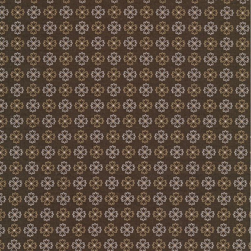 classic brown fabric featuring rows of alternating tan and cream flower outlines