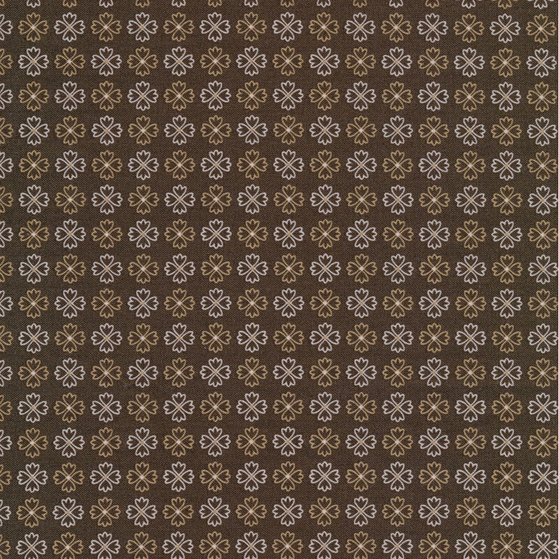 classic brown fabric featuring rows of alternating tan and cream flower outlines