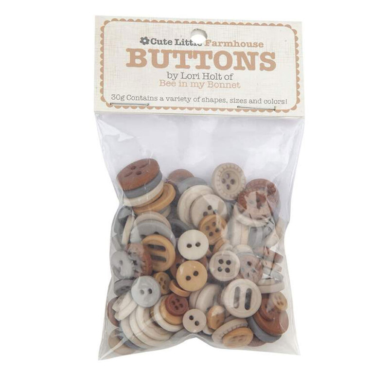 A pack of brown buttons in a small plastic package
