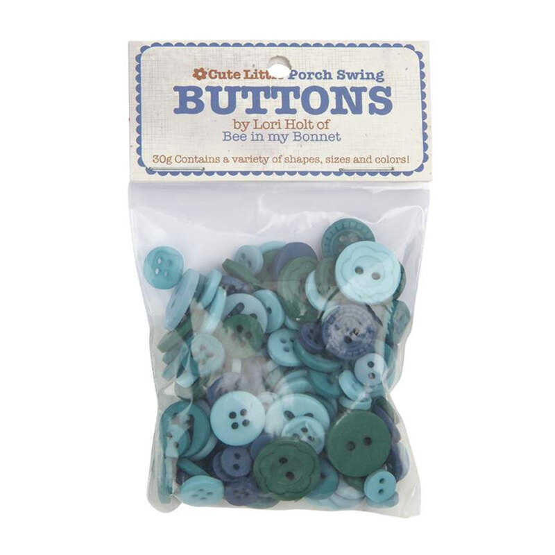 A pack of blue buttons in a small plastic package