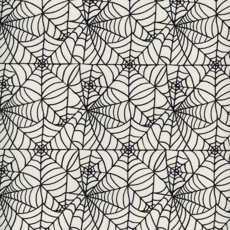 Cream fabric featuring a delicate and intricate black spiderweb design
