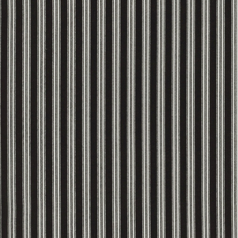 Black and white fabric featuring a striped pattern