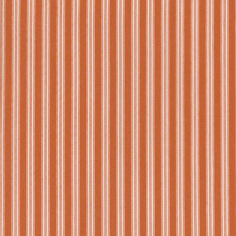 Orange and white fabric featuring a striped pattern
