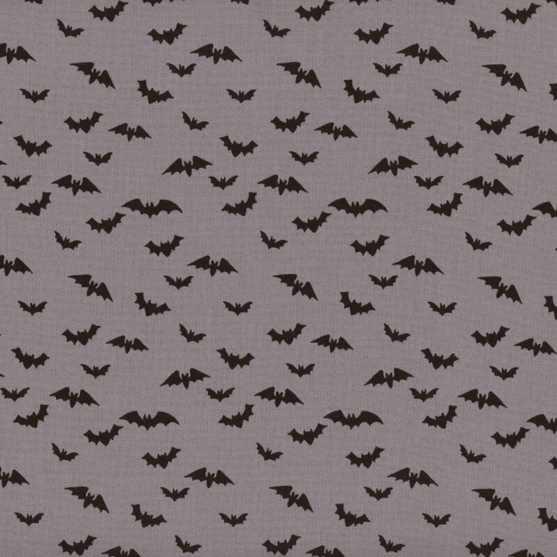 Gray fabric featuring scattered flying black bats.