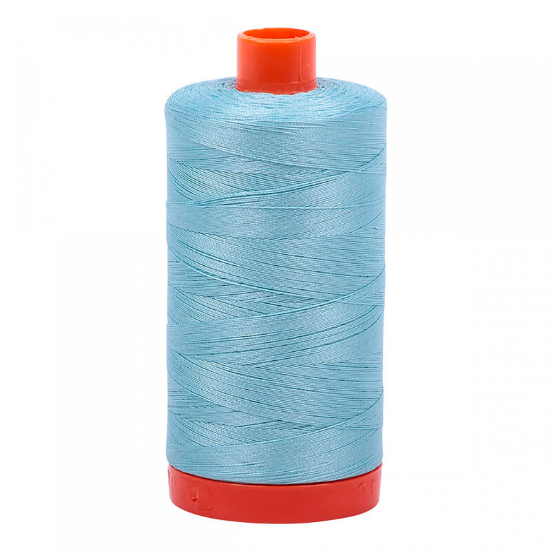 A spool of Aurifil 2805 - Light Grey Turquoise thread on a white background