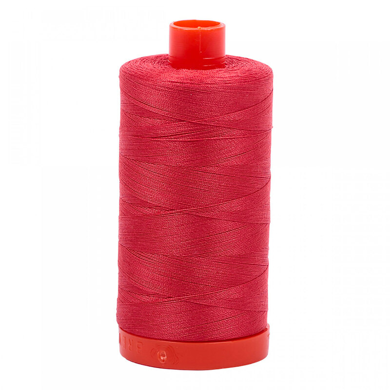 A spool of Aurifil 2255 -Dark Red Orange thread on a white background