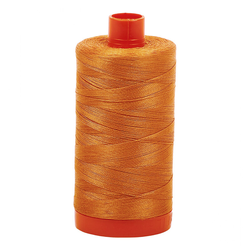 A spool of Aurifil 5009 -Medium Orange thread on a white background