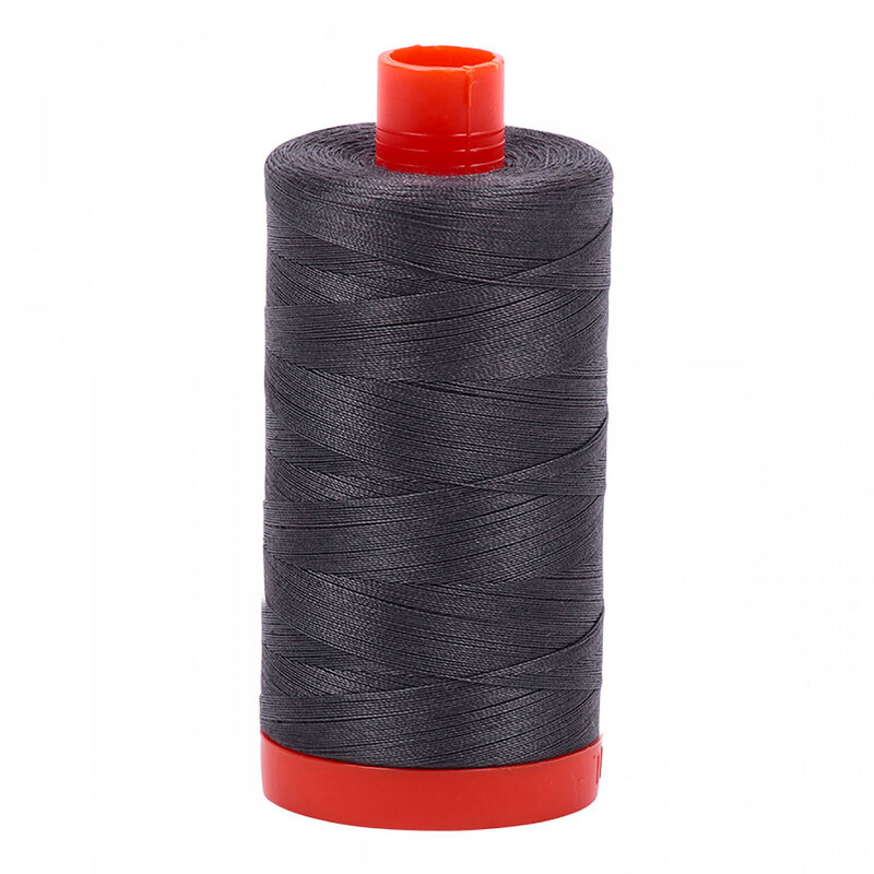 A spool of Aurifil 2630 -Pewter thread on a white background