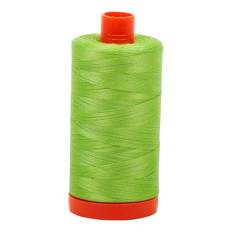 A spool of Aurifil 5017 - Shining Green thread on a white background