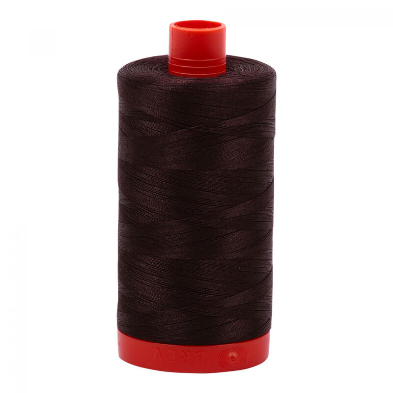A spool of Aurifil 5024 -Dark Brown thread on a white background