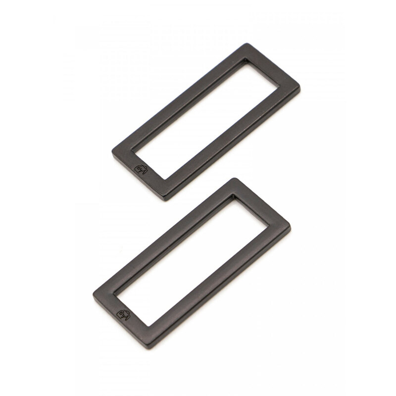 2 black metal rectangle rings on a white background
