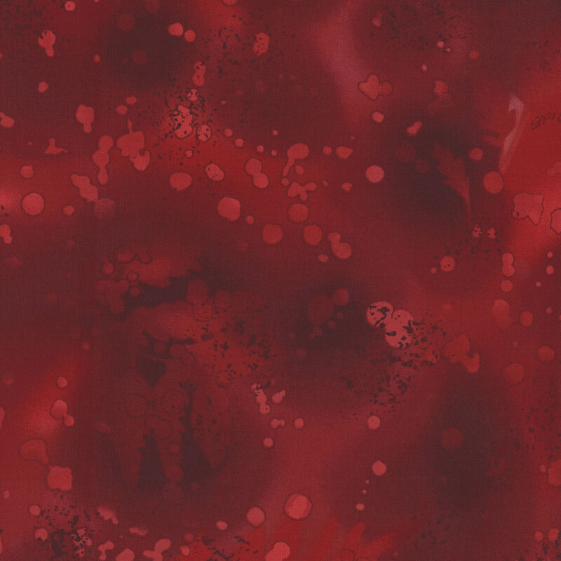 fabric featuring a deep red watercolor background with complementary mottling and abstract fern designs