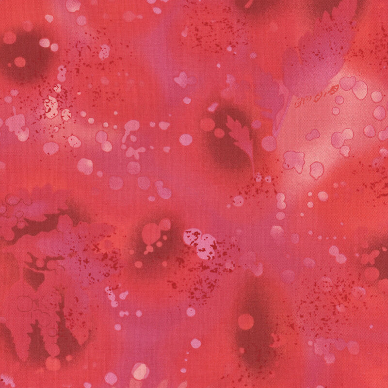 fabric featuring a vibrant pink watercolor background with complementary mottling and abstract fern designs