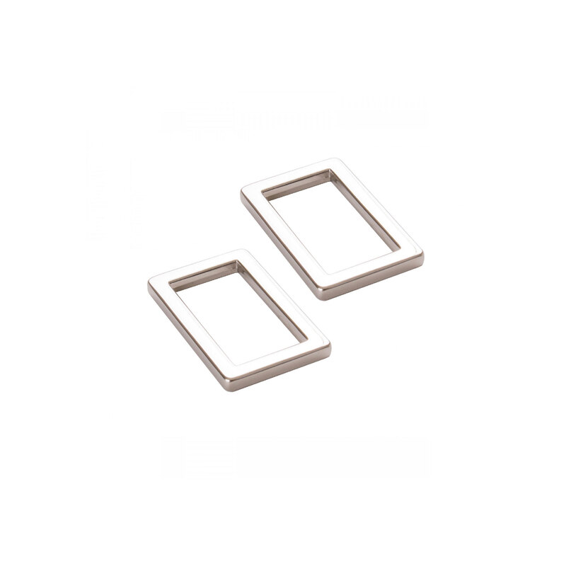 2 silver metal rectangle rings on a white background