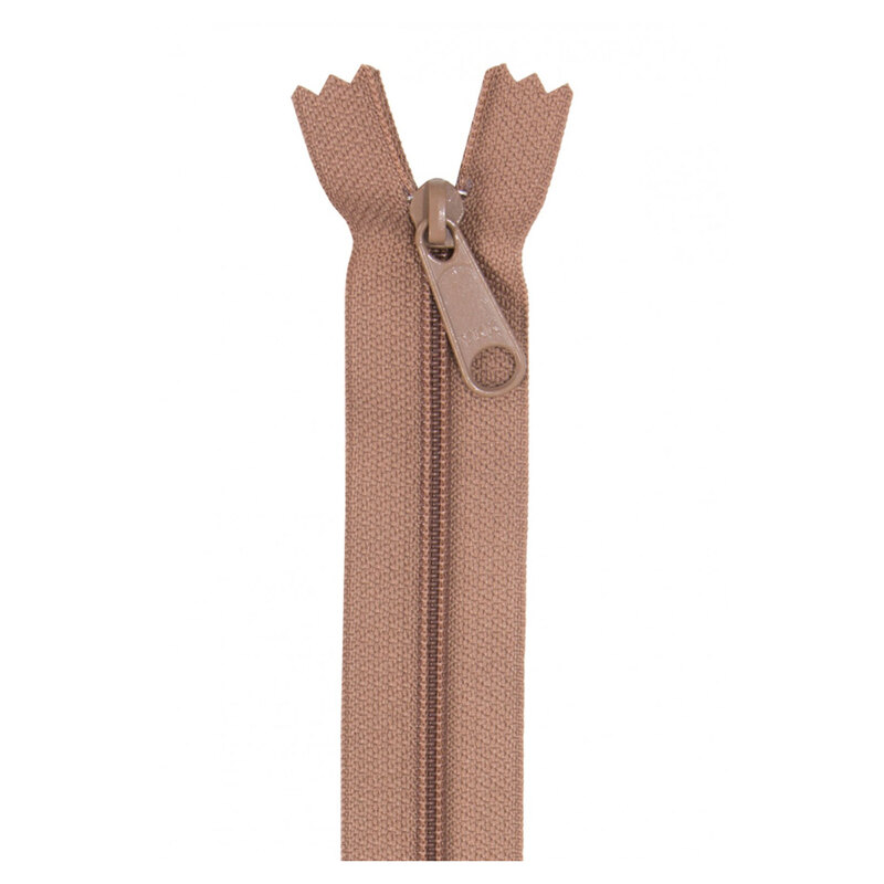 Photo of a light brown zipper isolated on a white background