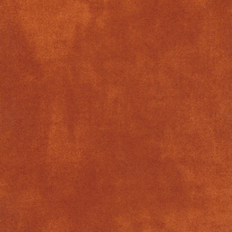 Mottled medium orange flannel fabric