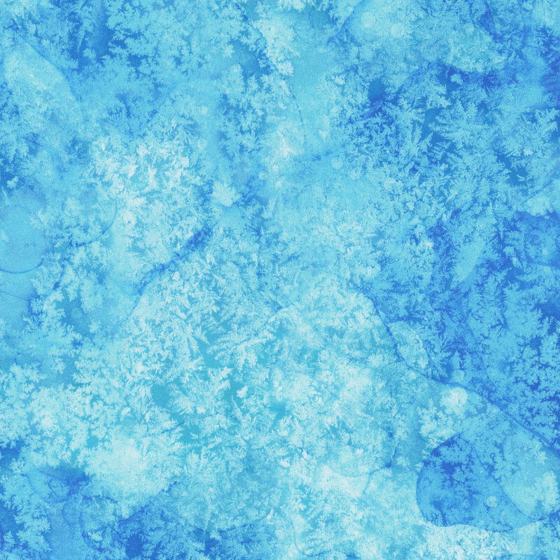 Bright blue tonal with textural impressions of tossed icy frost
